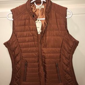 rust colored vest